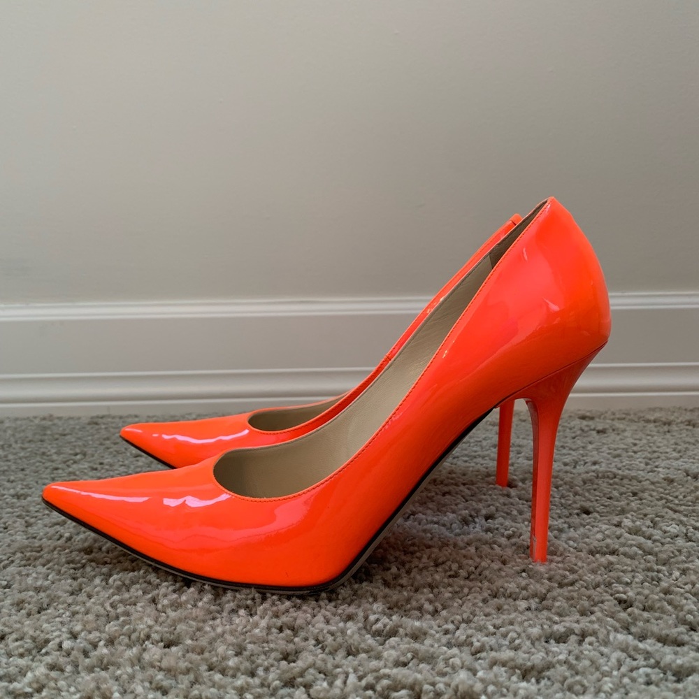Size 7.5 Jimmy Choo patent orange pumps! About 9 years old, some scuffs